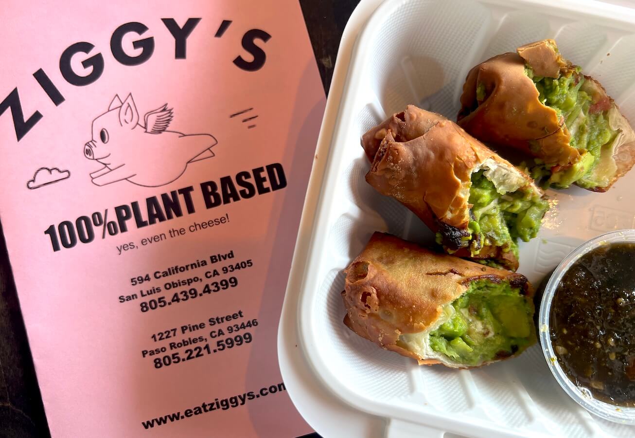 Ziggys menu beside plant-based avocado egg rolls